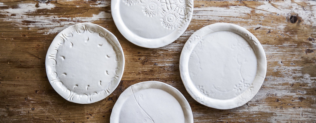 handmade embroidered stoneware plates